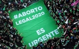 May be an image of one or more people, crowd and text that says '#ABORTO LEGAL2020 URGENTE LIRCENTE ES'